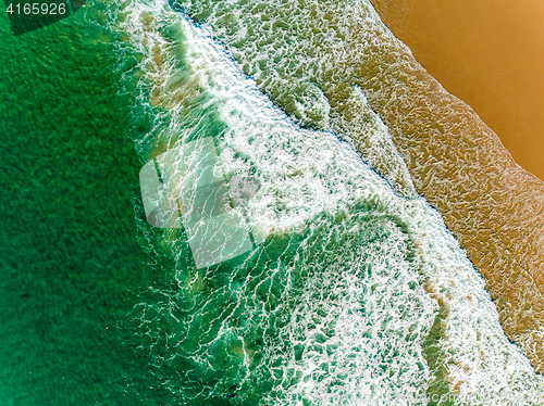 Image of Aerial View Amazing Seascape with Small Waves on Sandy Beach