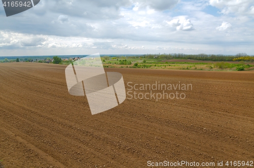 Image of Agircutural field with brown soil