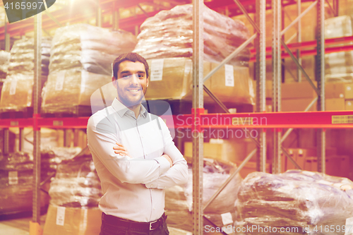 Image of happy man at warehouse