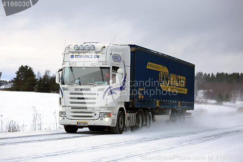 Image of White Scania Semi Truck Transport in Winter