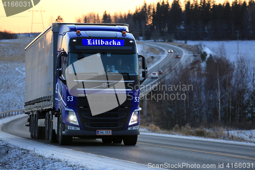 Image of Blue Volvo FH Cargo Truck Transport at Sunset 