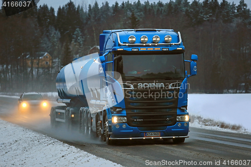 Image of Blue Scania R580 Tank Truck Trucking on Highway Road Salt