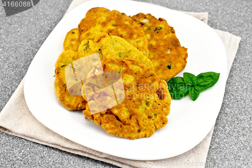 Image of Flapjack chickpeas in plate on stone table