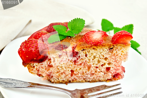 Image of Pie strawberry with jelly on light board