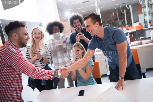 Image of Multiethnic startup business team on meeting
