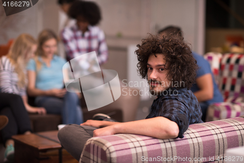 Image of Portrait of young informal businessman