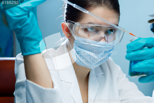 Image of Chemical lab with laboratory assistant
