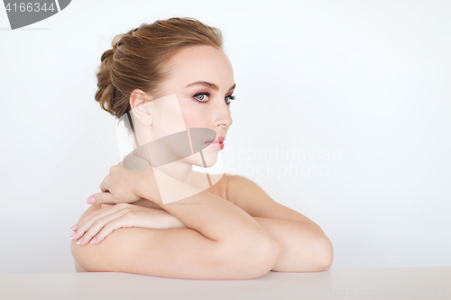 Image of beautiful young woman face and hands