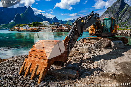 Image of Excavator, bulldozer repair work on the road. Norway