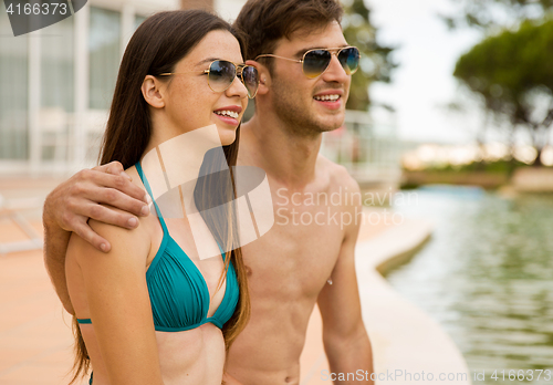 Image of Sitting by the pool