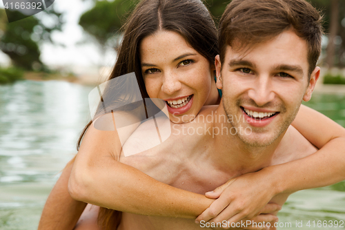 Image of Young couple having fun