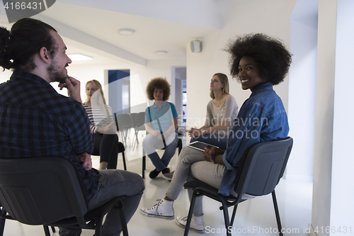 Image of Multiethnic startup business team on meeting