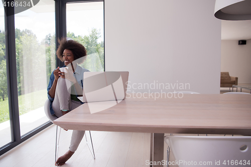 Image of African American woman in the living room