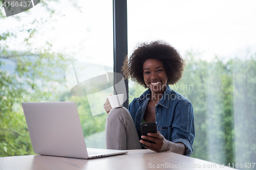 Image of African American woman in the living room