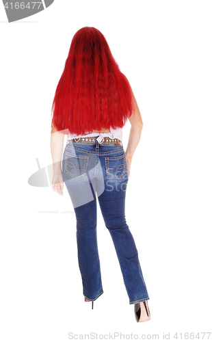 Image of Woman with long red hair from back.