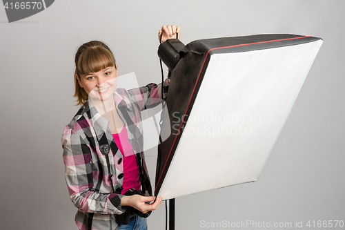 Image of Photographer studio sets the correct direction of light softbox