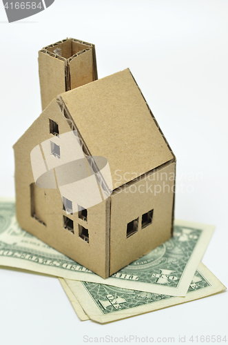 Image of Paper house model and money