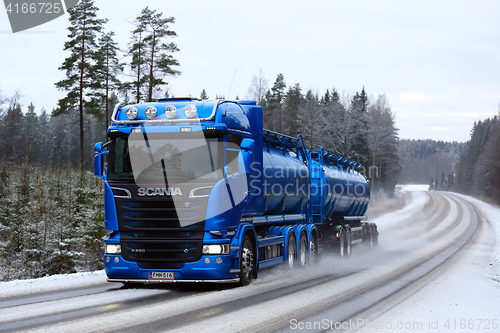 Image of Blue Scania Tank Truck on Winter Road