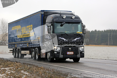 Image of Black Renault Trucks T Delivers Cargo Trailer