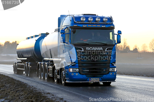 Image of Blue Scania R580 Tank Truck Transport at Sunset