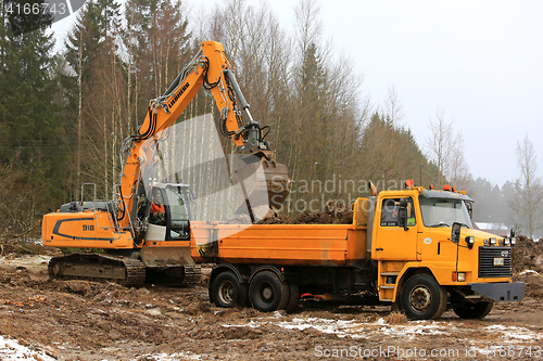 Image of Loading Soil onto Sisu Truck with Liebherr R918 Crawler Excavato