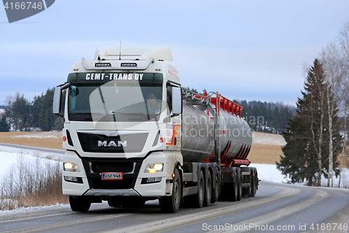 Image of White MAN Tank Truck on the Road