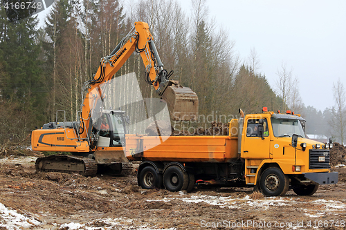 Image of Liebherr Crawler Excavator Loads Sisu Truck