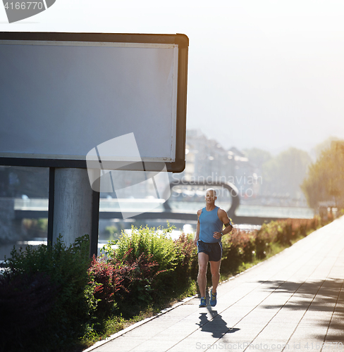Image of Elderly man jogging