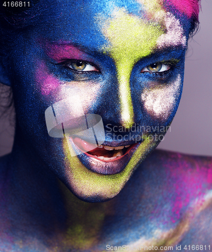 Image of beauty woman with creative make up like Holy celebration in India