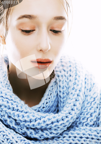 Image of beauty young blond woman in scarf with weathered lips close up isolated