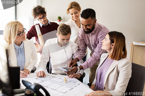 Image of business team discussing house project at office