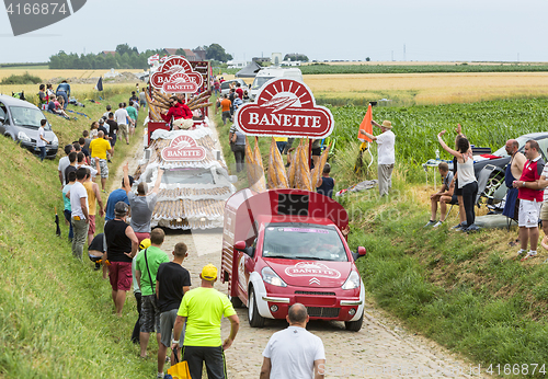 Image of Banette Caravan on a Cobblestone Road- Tour de France 2015