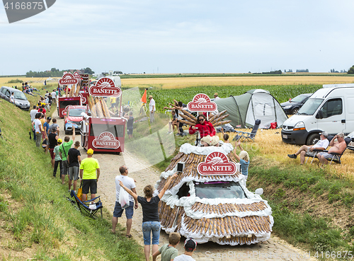 Image of Banette Caravan on a Cobblestone Road- Tour de France 2015