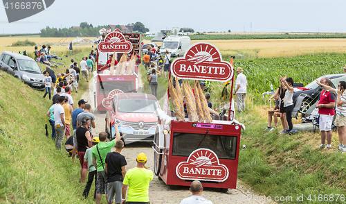 Image of Banette Caravan on a Cobblestone Road- Tour de France 2015