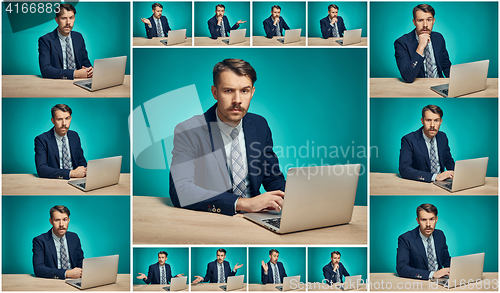 Image of Sad Young Man Working On computer At Desk