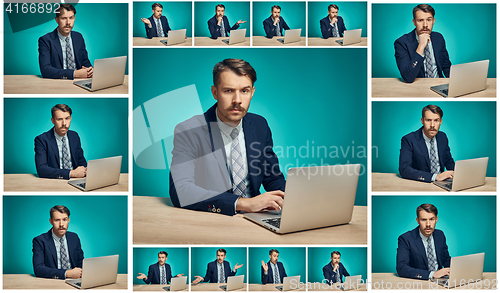 Image of Sad Young Man Working On computer At Desk