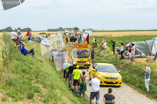 Image of BIC Caravan on a Cobblestone Road- Tour de France 2015