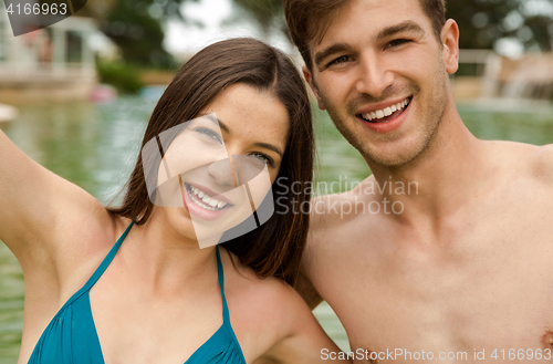 Image of Young couple having fun