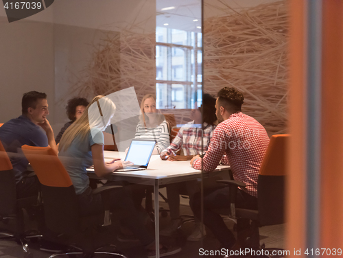 Image of Multiethnic startup business team on meeting
