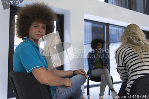 Image of Multiethnic startup business team on meeting