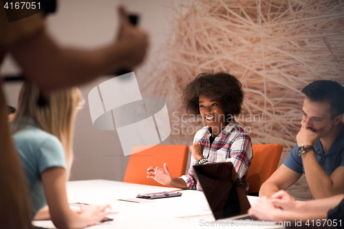 Image of Multiethnic startup business team on meeting