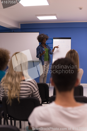 Image of Black woman Speaker Seminar Corporate Business Meeting Concept