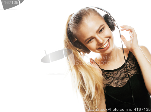 Image of young sweet teenage girl in headphones singing isolated