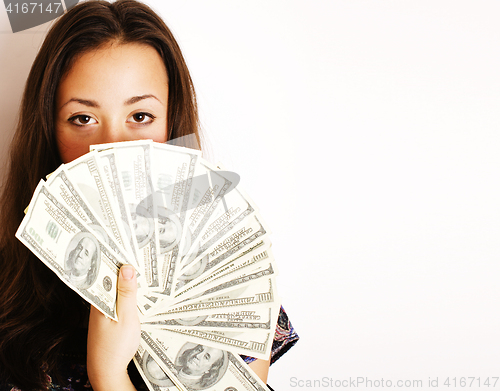 Image of portrait of pretty young woman with money, isolated on white background