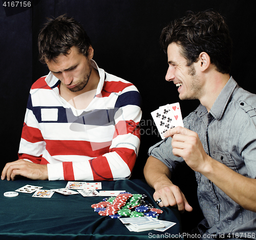 Image of young people playing poker