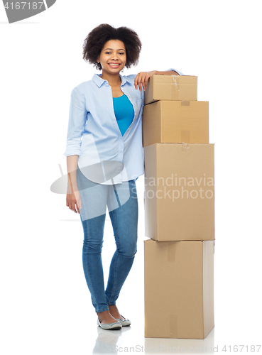 Image of happy afro american woman with parcel boxes