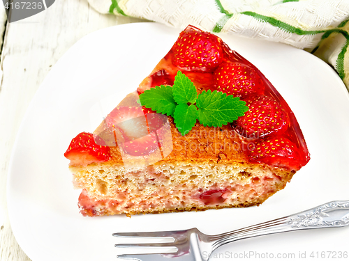 Image of Pie strawberry with jelly in plate on board