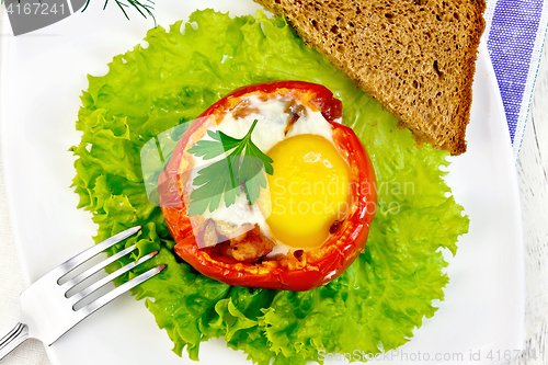 Image of Scrambled eggs in tomato on light board top