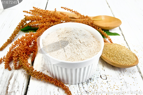 Image of Flour amaranth in bowl with spoon and flower on board