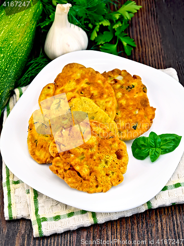 Image of Flapjack chickpeas with basil in plate on board